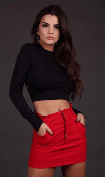 black crop top with red jeans