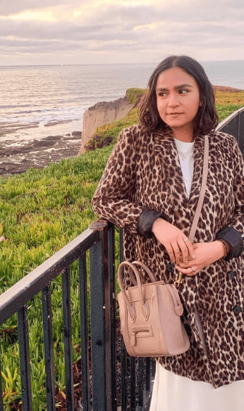Aranxa wearing cheetah print coat