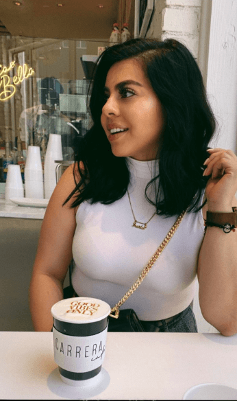 Marlu holding latte